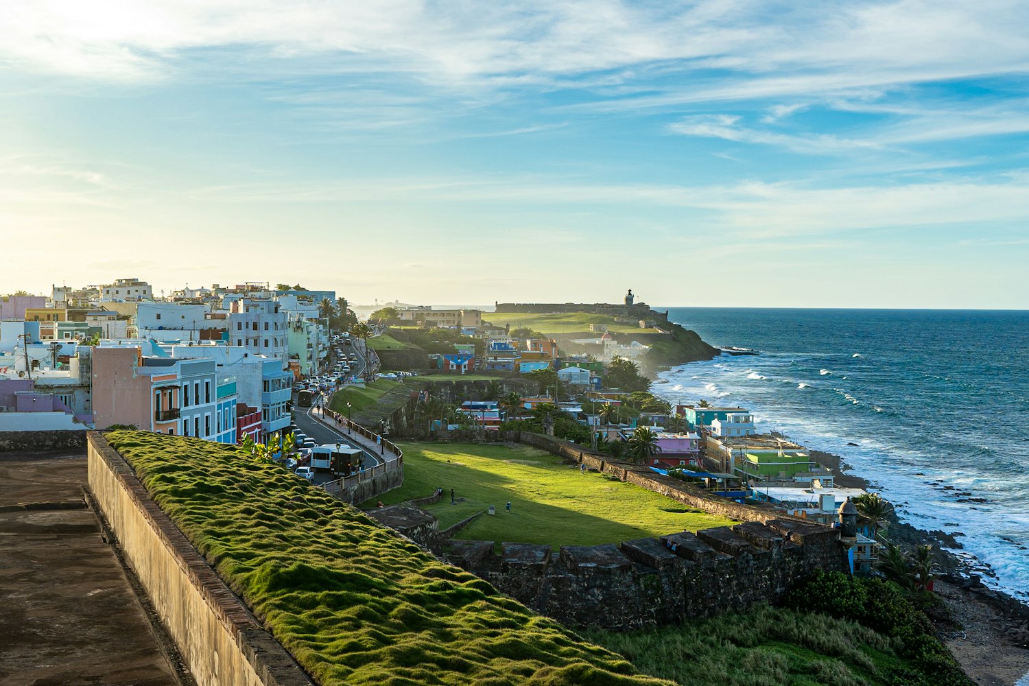 Old San Juan, Puerto Rico, with colorful houses, a fortress wall and the Atlantic coast
