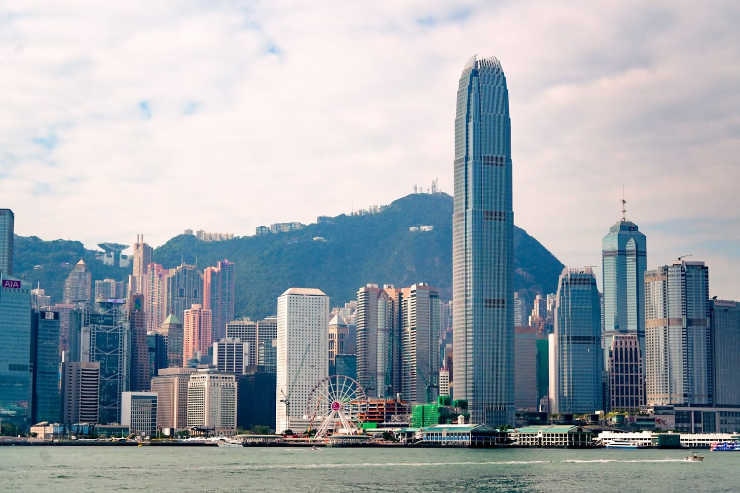 Hong Kong Island's skyline and Victoria Peak seen across Victoria Harbour